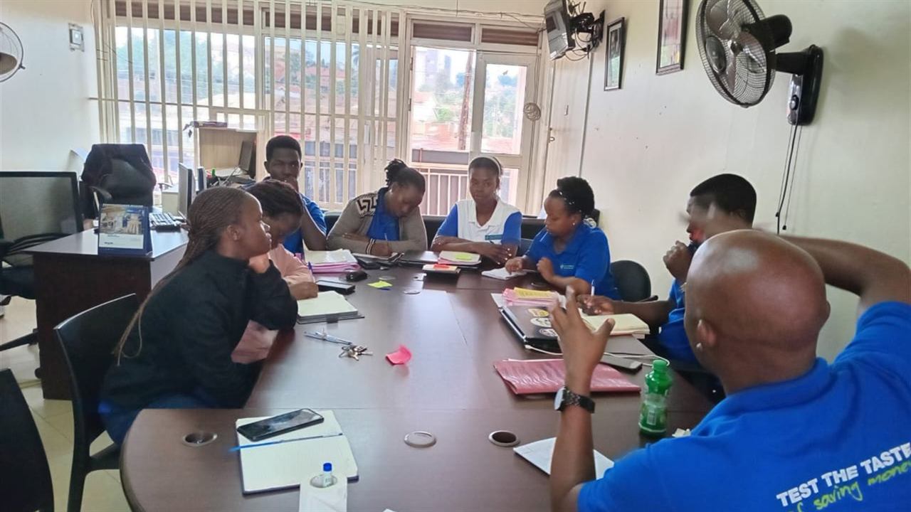 NECOS members and staff meeting at the Ntinda office