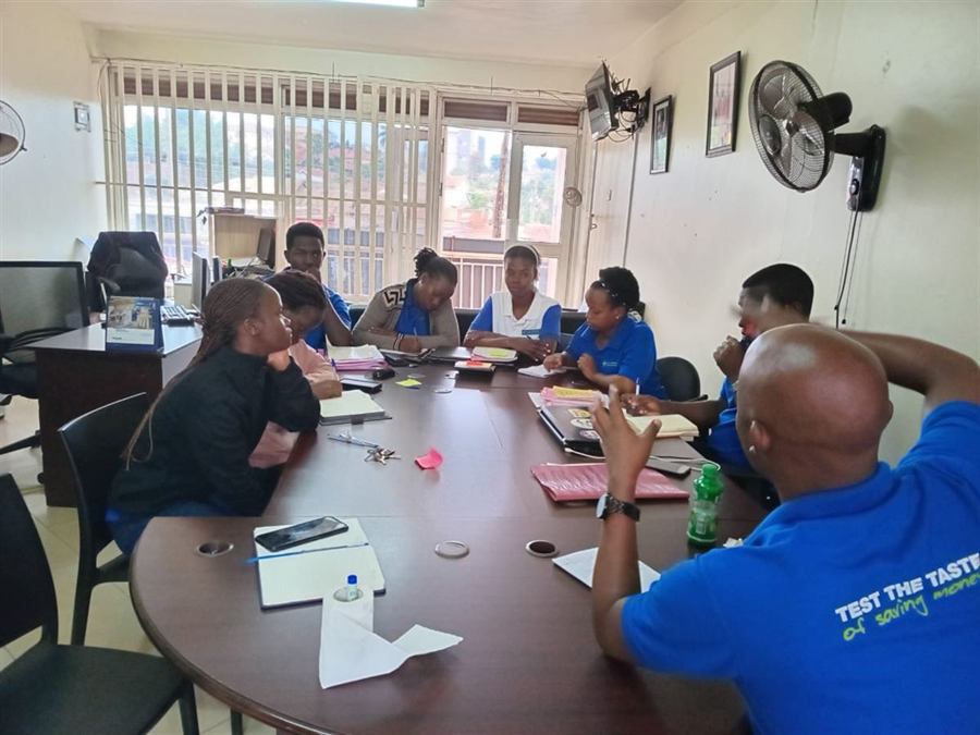 NECOS members and staff meeting at the Ntinda office
